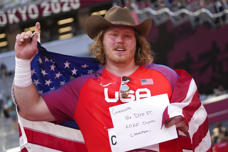 'We did it': Crouser's gold a tribute to his fallen grandpa